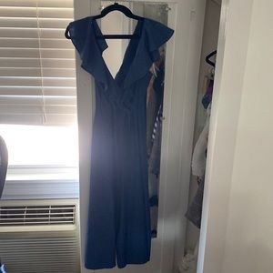 Beautiful navy jumpsuit. Perfect for special occasions or work!